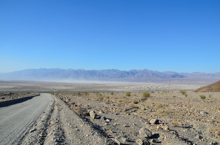 HJS_4620.JPG - From Mosaic Canyon - view of Stovepipe Wells Village - Wind blowing up dust in the valley
